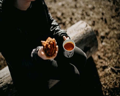 A person drinking tea while taking a break