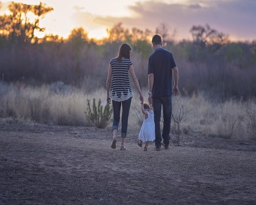 A family walking together in the evening